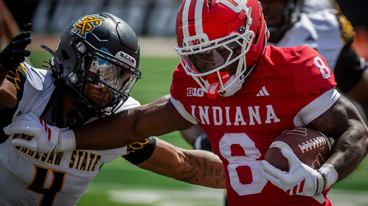 Indiana's Kaelon Black (8) avoids Kennesaw State's Alexander Ford (4) during the Indiana versus Kennesaw State Big Ten football game at Memorial Stadium on Saturday, Sept. 6, 2025