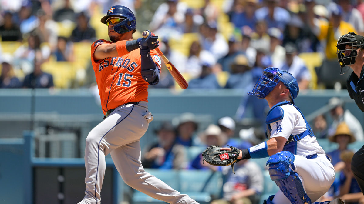 Houston Astros designated hitter Isaac Paredes (15) hits a double against the Los Angeles Dodgers during the third inningC of the game at Dodger Stadium.