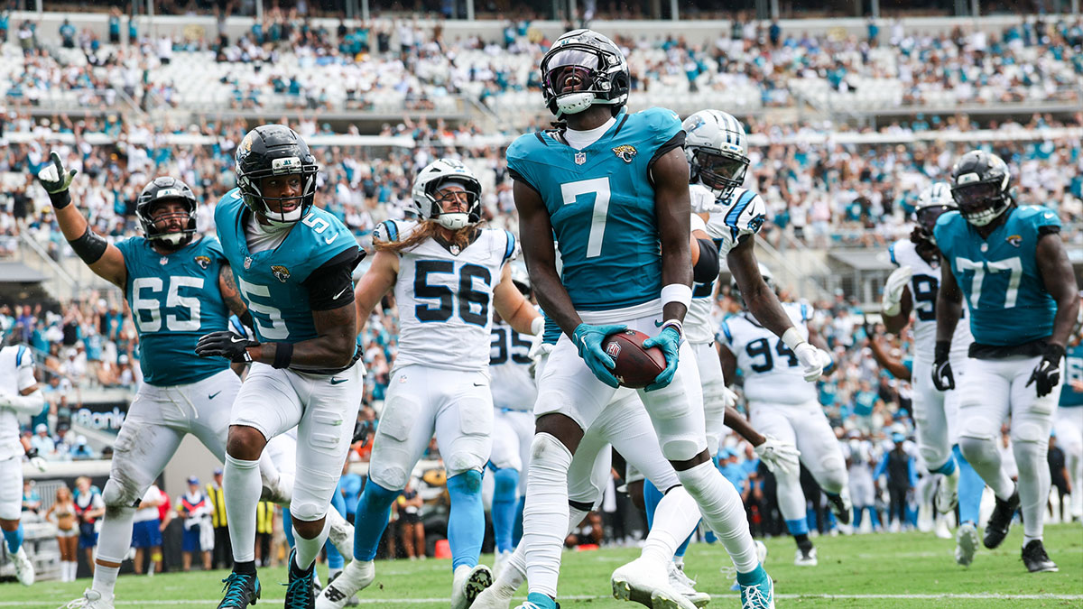 Jacksonville Jaguars wide receiver Brian Thomas Jr. (7) reacts after scoring on a 9-yard touchdown run against the Carolina Panthers during the first half at EverBank Stadium.