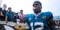 Jacksonville Jaguars wide receiver Travis Hunter (12) walks to greet fans after the game of an NFL football matchup at EverBank Stadium