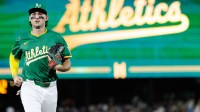 Athletics shortstop Jacob Wilson (5) runs back to the dugout during the game against the San Francisco Giants at Sutter Health Park.