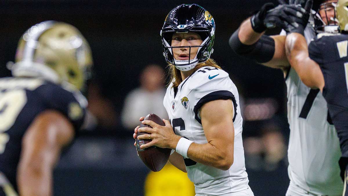 Jacksonville Jaguars quarterback Trevor Lawrence (16) looks downfield against the New Orleans Saints during the first half at Caesars Superdome.