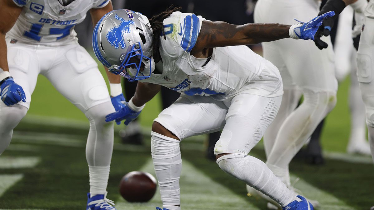 Detroit Lions running back Jahmyr Gibbs (0) reacts after rushing for a touchdown against the Baltimore Ravens during the first half at M&T Bank Stadium.