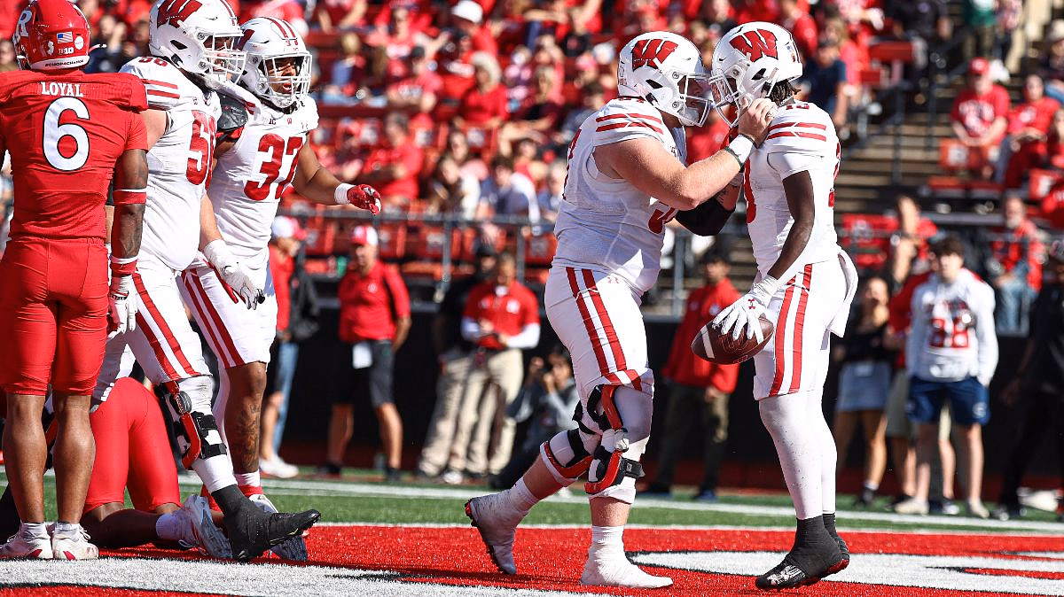Wisconsin Badgers running back Darrion Dupree (13) celebrates his touchdown run with offensive lineman Jake Renfro (57) during the second half against the Rutgers Scarlet Knights at SHI Stadium.