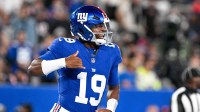 New York Giants quarterback Jameis Winston (19) celebrates a touchdown during the first quarter against the New England Patriots at MetLife Stadium.