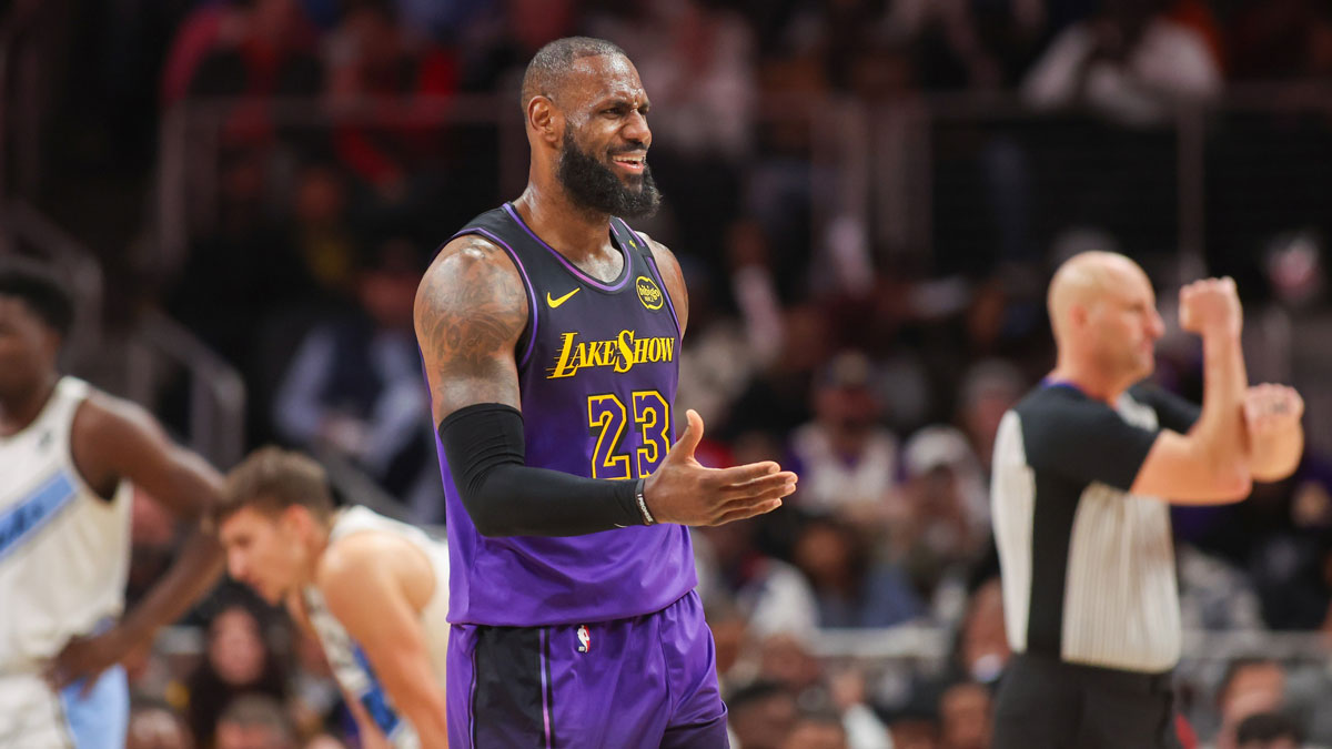 Los Angeles Lakers forward LeBron James (23) reacts after being fouled against the Atlanta Hawks in the fourth quarter at State Farm Arena.