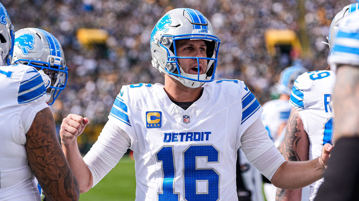 Detroit Lions quarterback Jared Goff (16) cheers up teammates on the sideline before a first down against Green Bay Packers during the first half at Lambeau Field in Green Bay, Wis., on Sunday, September 7, 2025.