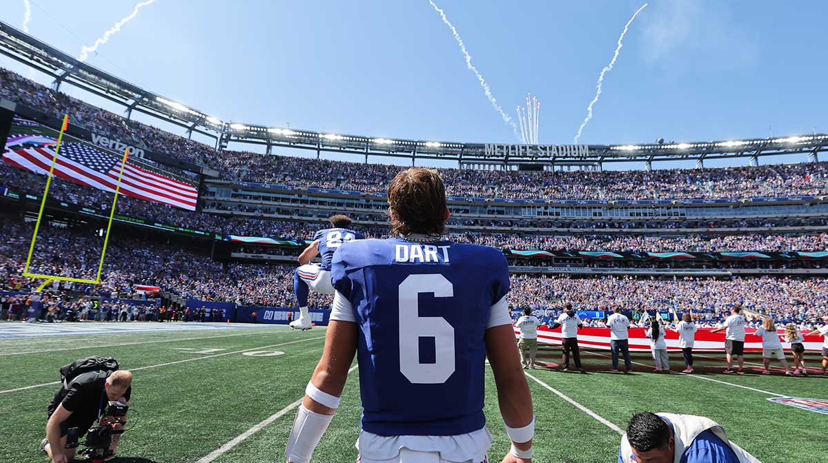 New York Giants quarterback Jaxson Dart (6) looks on before the game against the Los Angeles Chargers at MetLife Stadium.