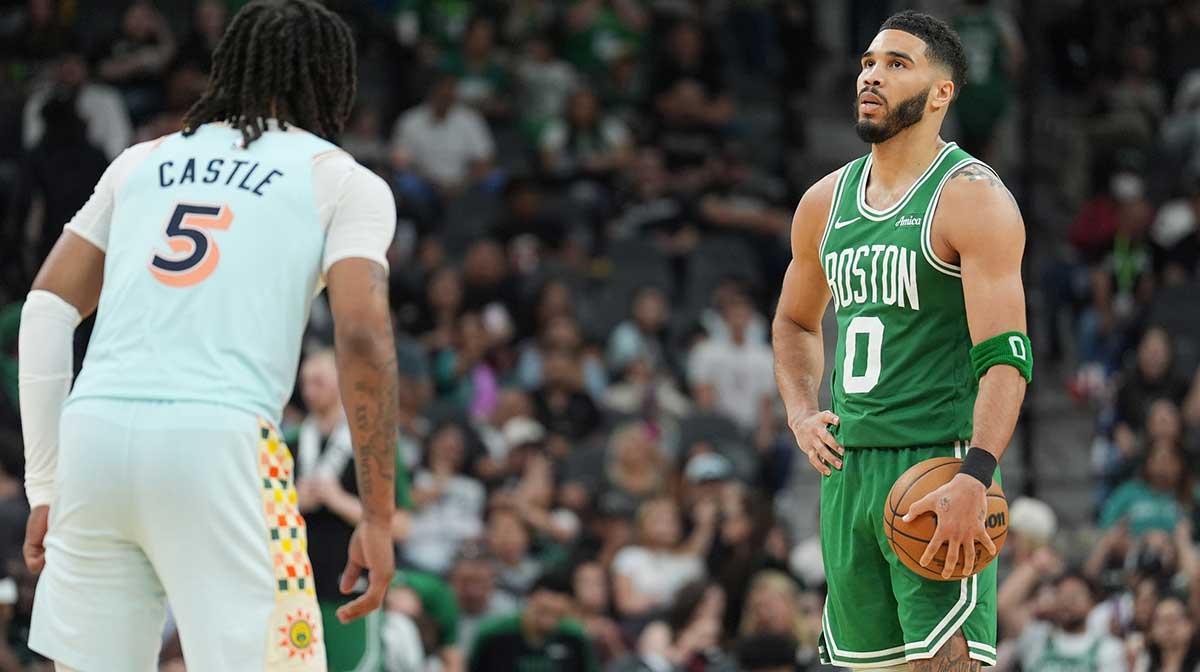 Boston Celtics forward Jayson Tatum (0) waits for the clock to run out in front of San Antonio Spurs guard Stephon Castle (5) in the second at Frost Bank Center.