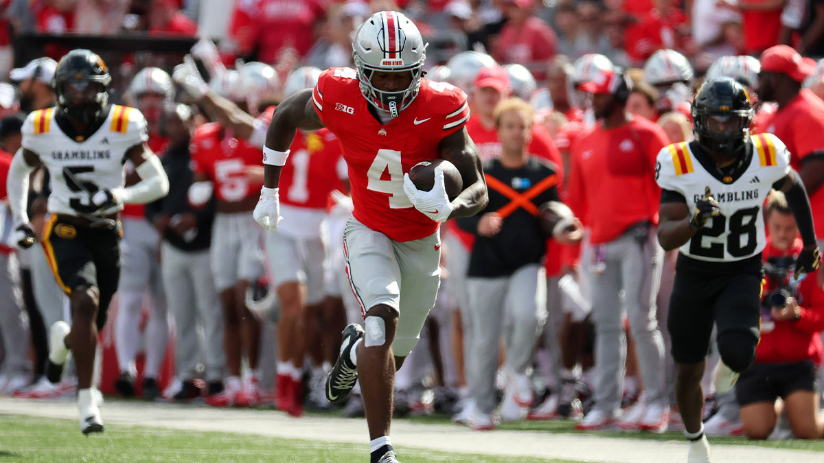 Ohio State Buckeyes wide receiver Jeremiah Smith (4) scores a touchdown during the first quarter against the Grambling State Tigers at Ohio Stadium.