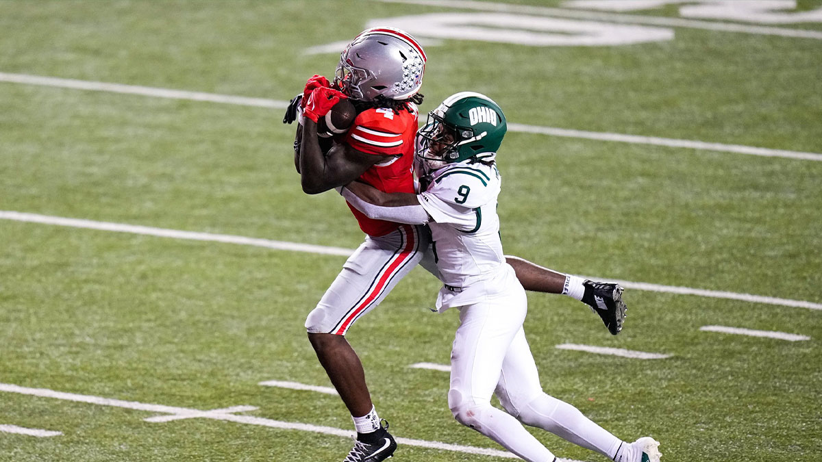 Ohio State Buckeyes wide receiver Jeremiah Smith (4) catches a pass against Ohio Bobcats cornerback Michael Mack II (9) in the second half at the Ohio Stadium on Saturday, Sept. 13, 2025 in Columbus, Ohio.