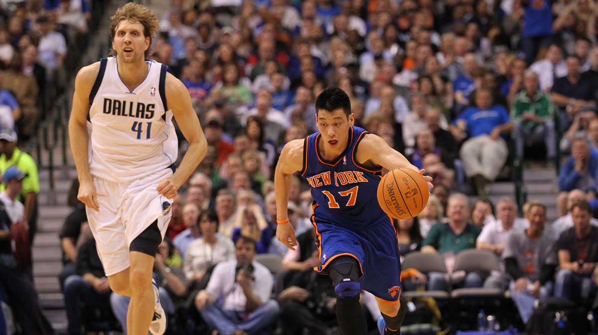 New York Knicks guard Jeremy Lin (17) drives up-court after stealing a pass intended for Dallas Mavericks forward Dirk Nowitzki (41) at American Airlines Center.