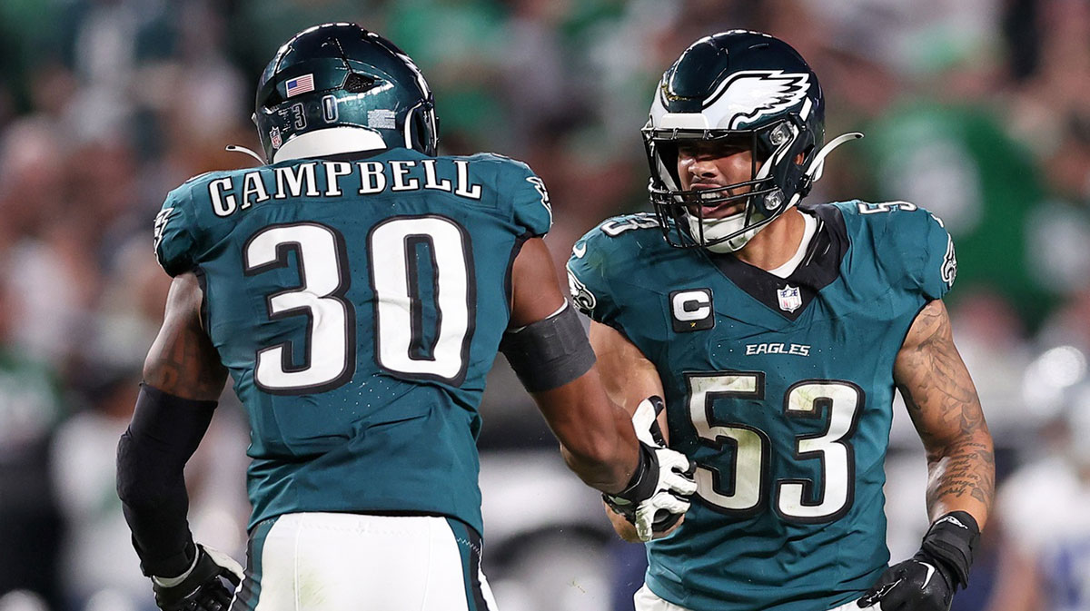 Philadelphia Eagles linebacker Jihaad Campbell (30) and linebacker Zack Baun (53) react after a play against the Dallas Cowboys during the third quarter of the game at Lincoln Financial Field.