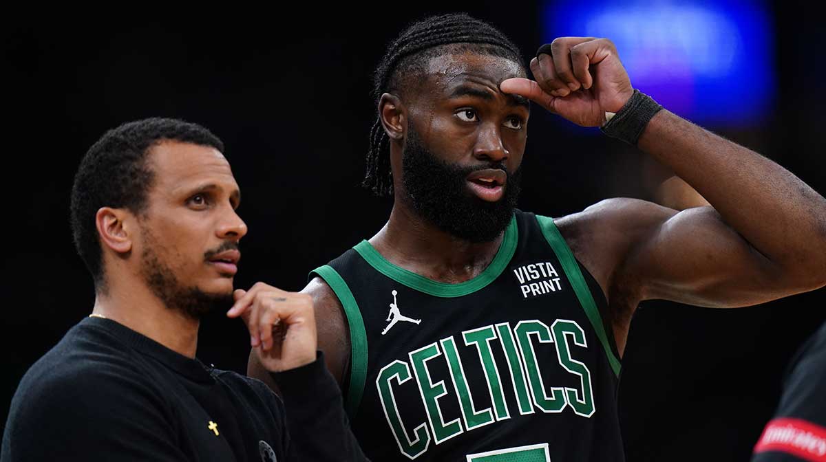 Boston Celtics head coach Joe Mazzulla talks with guard Jaylen Brown (7) from the sideline as they take on the Indiana Pacers during game two of the eastern conference finals for the 2024 NBA playoffs at TD Garden.