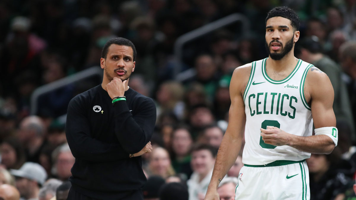 Boston Celtics head coach Joe Mazzulla and Boston Celtics forward Jayson Tatum (0) react during the first half against the Memphis Grizzlies at TD Garden.
