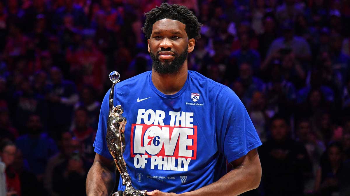 NBA Philadelphia 76ers center Joel Embiid (21) poses with the MVP trophy before game three of the 2023 NBA playoffs against the Boston Celtics at Wells Fargo Center.