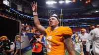Tennessee Volunteers quarterback Joey Aguilar (6) celebrates after a victory against the Syracuse Orange at Mercedes-Benz Stadium.