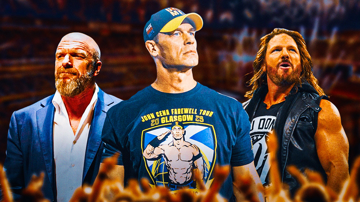 WWE star John Cena in between Paul Triple H Levesque and AJ Styles, who he will have a match against at Crown Jewel.