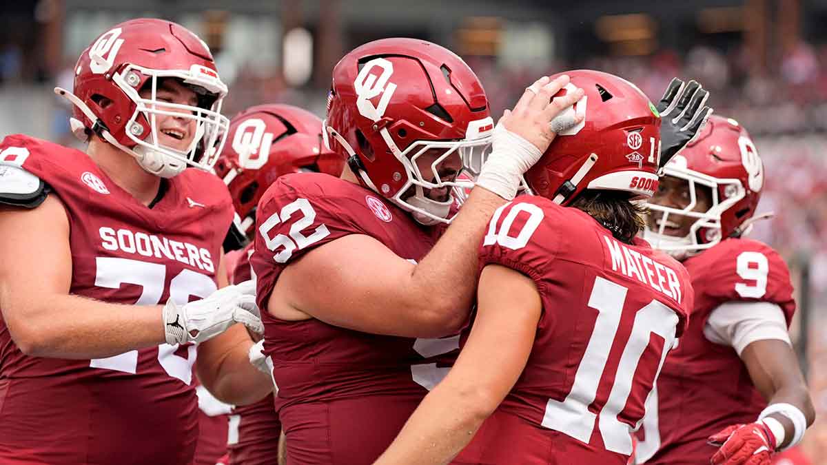 Oklahoma's John Mateer (10) celebrates his touchdown with Troy Everett (52) in the first half of the college football game between the University of Oklahoma Sooners and the Illinois State Redbirds at the Gaylord Family Oklahoma Memorial Stadium