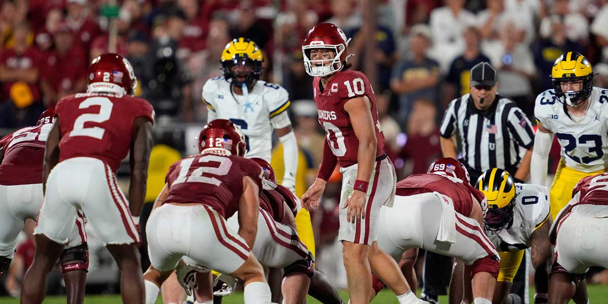 Oklahoma Sooners quarterback John Mateer (10) calls a play during a college football game between the University of Oklahoma Sooners (OU) and the University of Michigan Wolverines at Gaylord Family Ð Oklahoma Memorial Stadium