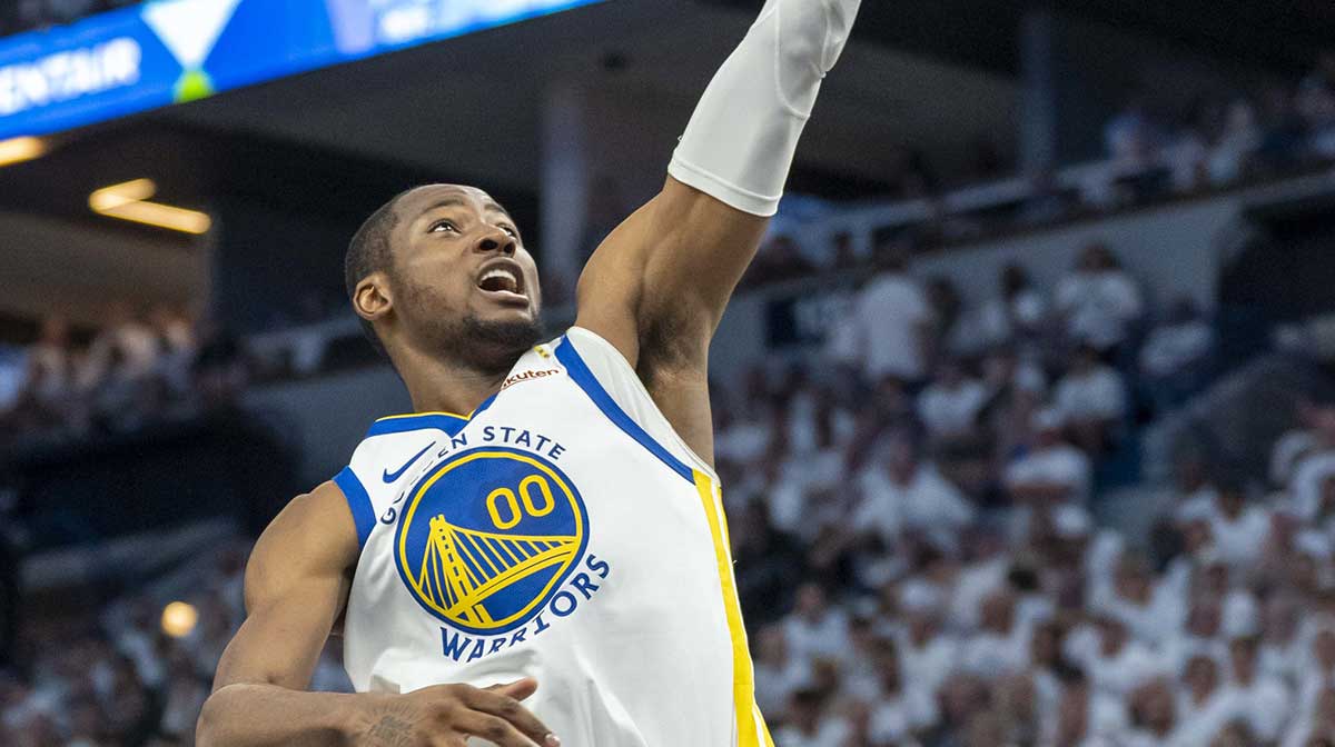 Golden State Warriors forward Jonathan Kuminga (00) drives to the basket against the Minnesota Timberwolves in the second half during game five of the second round for the 2025 NBA Playoffs at Target Center.
