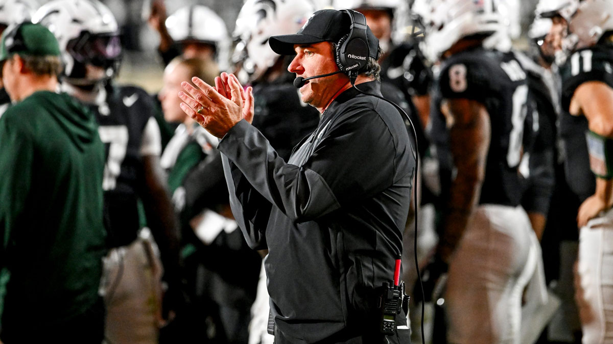 Michigan State's head coach Jonathan Smith claps while looking on during the second overtime in the game against Boston College on Saturday, Sept. 6, 2025, at Spartan Stadium in East Lansing.