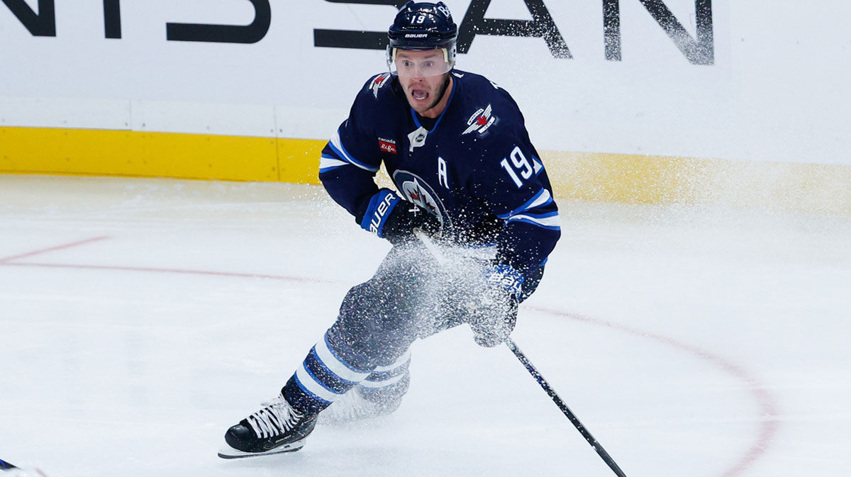 Winnipeg Jets forward Jonathan Toews (19) looks to make a pass in the Edmonton Oilers zone during the third period at Canada Life Centre.
