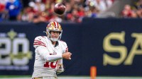 San Francisco 49ers quarterback Mac Jones (10) passes against the New Orleans Saints during the second half at Caesars Superdome.