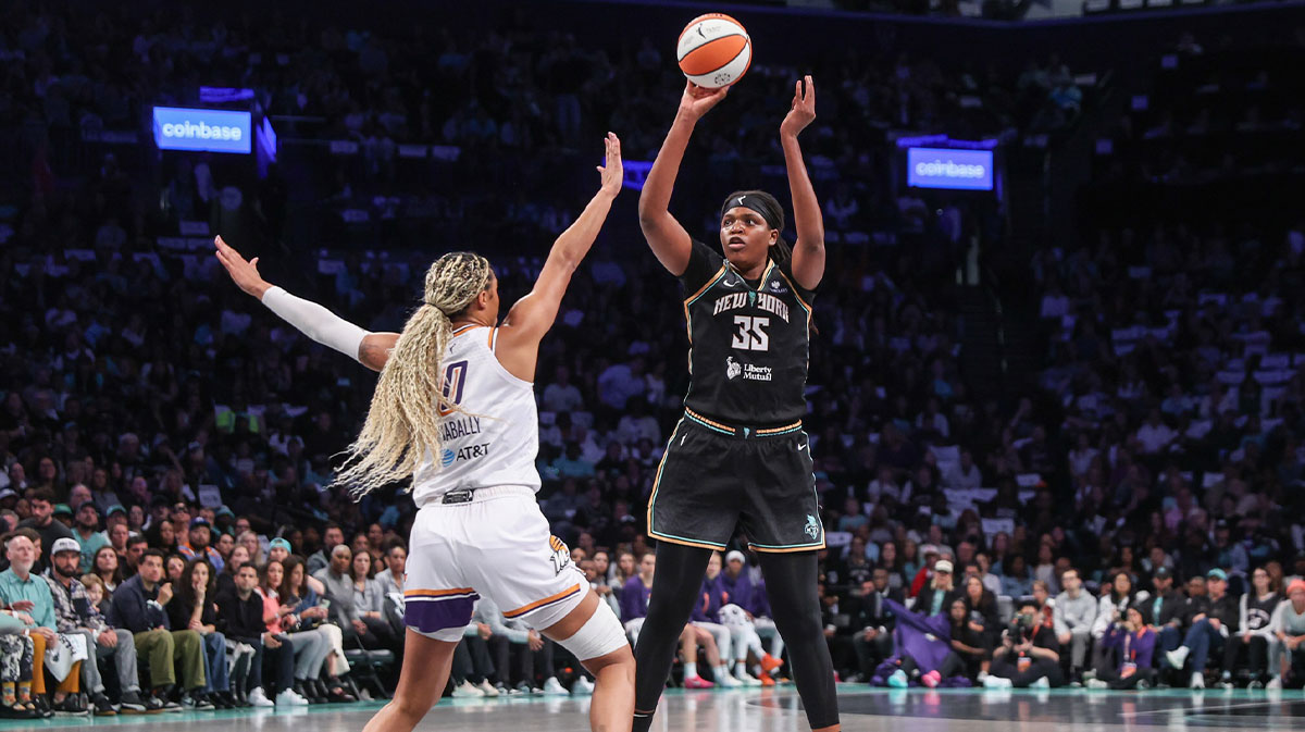 New York Liberty center Jonquel Jones (35) shoots past Phoenix Mercury forward Satou Sabally (0) during game two of round one for the 2025 WNBA Playoffs at Barclays Center.