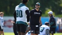 Jul 23, 2025; Philadelphia, PA, USA; Philadelphia Eagles head coach Nick Sirianni reacts with defensive tackle Jordan Davis (90) during training camp at NovaCare Complex.