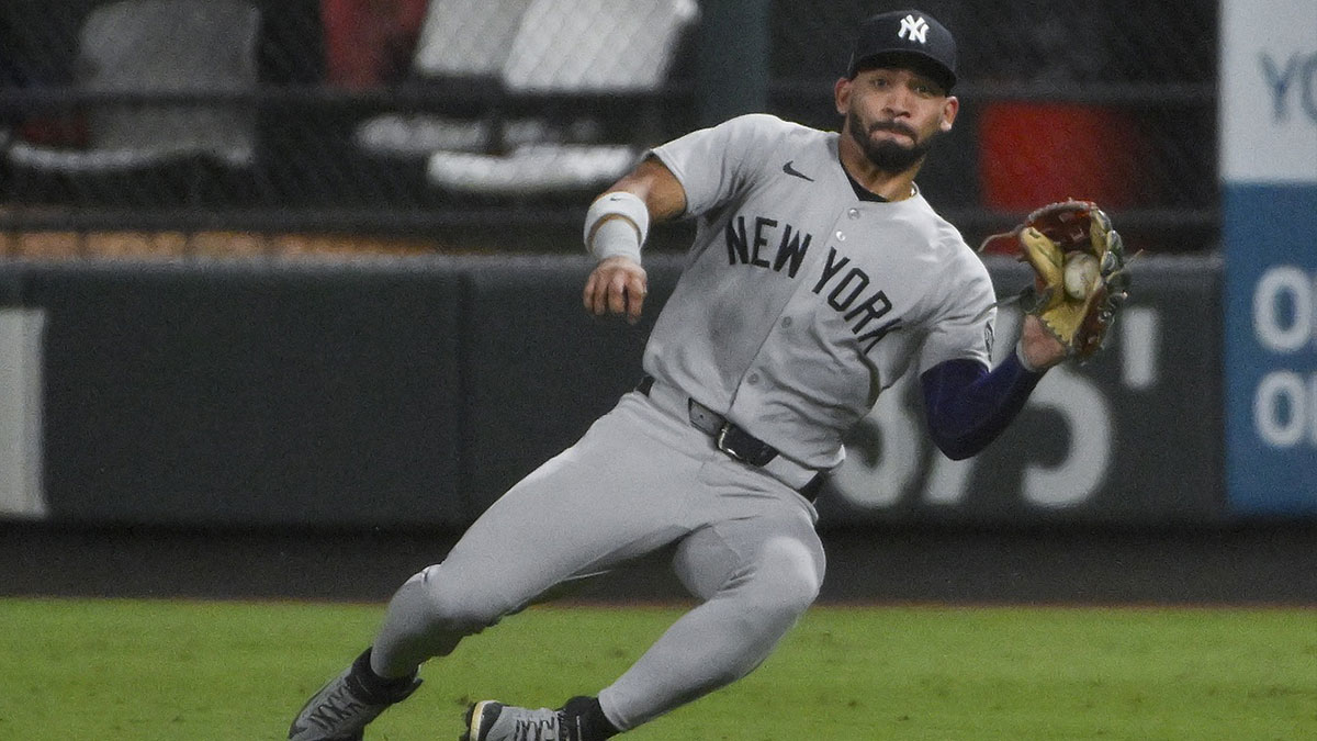 New York Yankees right fielder Jose Caballero (72) slides and catches a line drive hit by St. Louis Cardinals second baseman Thomas Saggese (not pictured) during the third inning at Busch Stadium. 