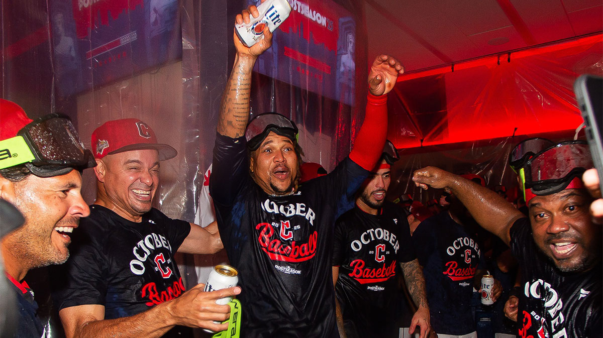 Cleveland Guardians third baseman Jose Ramirez (11) celebrates after the Guardians beat the Texas Rangers and clinched a playoff berth at Progressive Field.