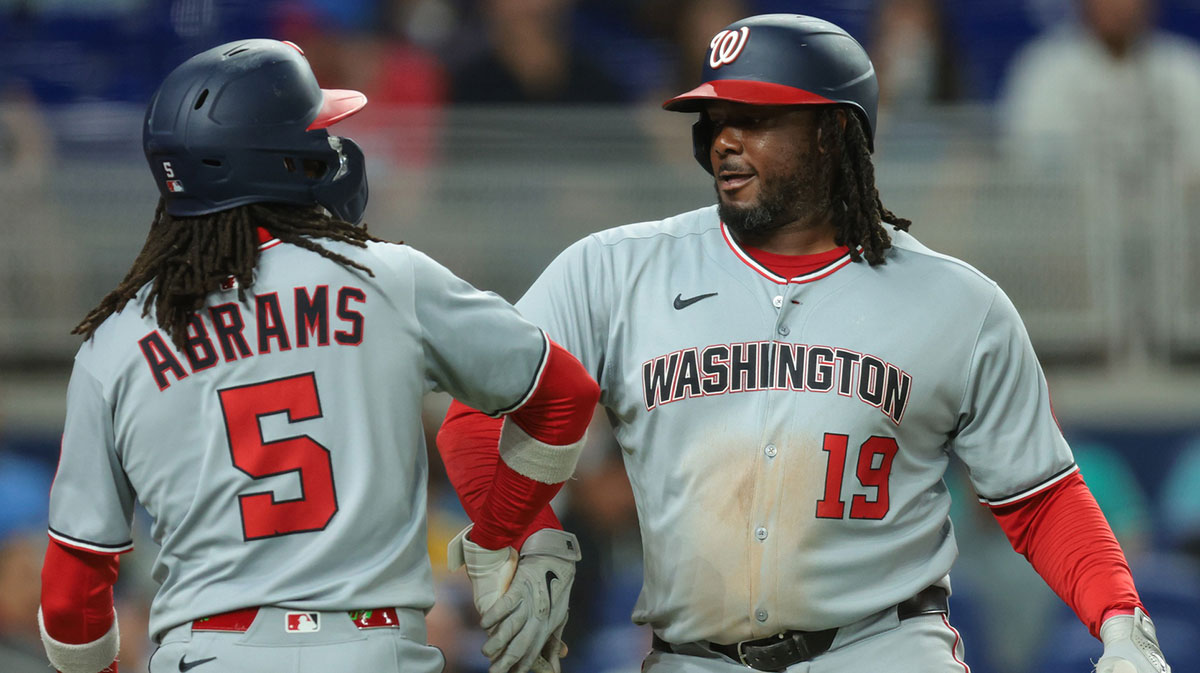 Washington Nationals first baseman Josh Bell (19) celebrates with shortstop CJ Abrams (5) after hitting a two-run home run against the Miami Marlins during the sixth inning at loanDepot Park.