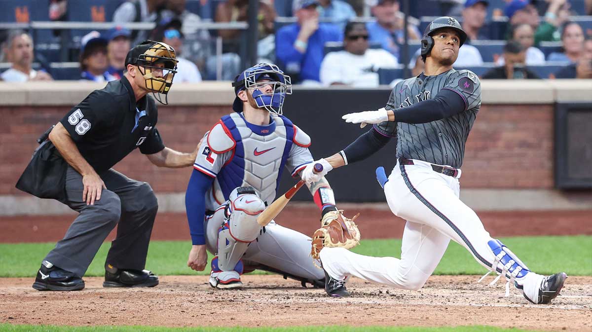 New York Mets right fielder Juan Soto (22) hits a solo home run in the seventh inning against the Texas Rangers at Citi Field. 