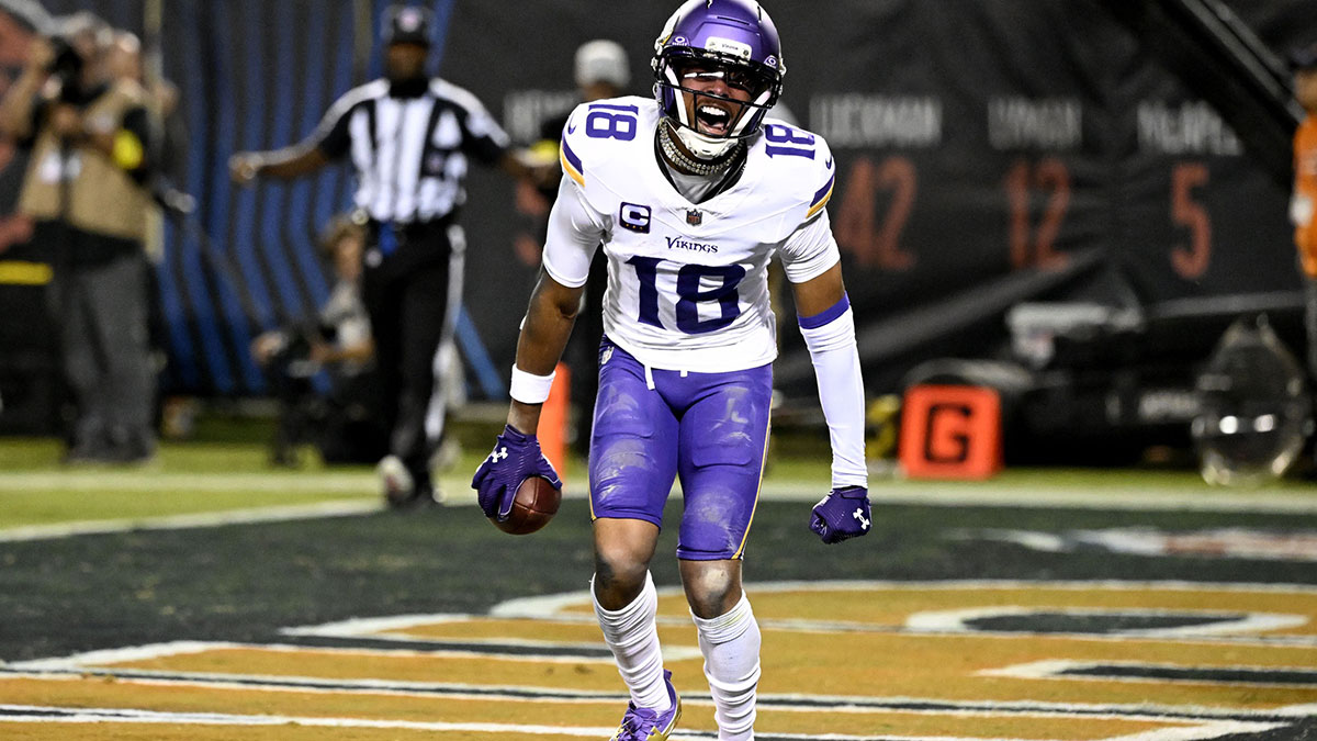 Minnesota Vikings wide receiver Justin Jefferson (18) reacts after scoring a touchdown against the Chicago Bears during the second half at Soldier Field.