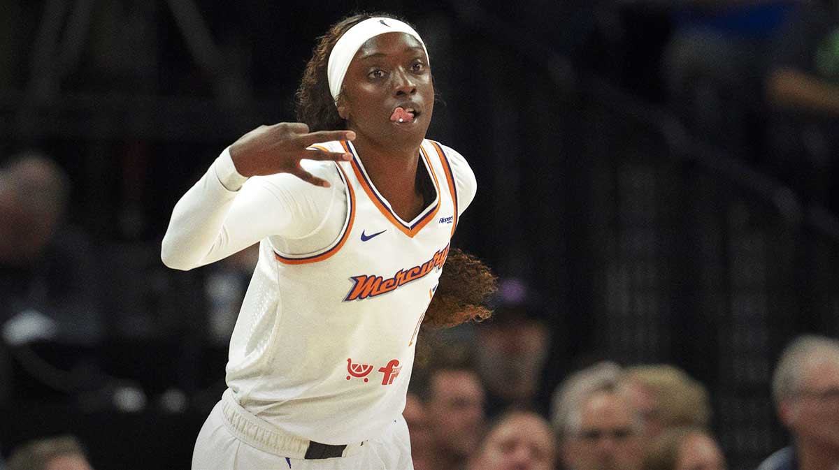 Phoenix Mercury guard Kahleah Copper (2) celebrates making a three point shot against the Minnesota Lynx in the first half during game two of the second round for the 2025 WNBA Playoffs at Target Center.