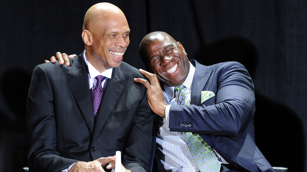 NBA players Kareem Abdul-Jabbar and Irvin "Magic" Johnson on stage during the ceremony unveiling the Kareem Abdul-Jabbar statue in front of the Staples Center.