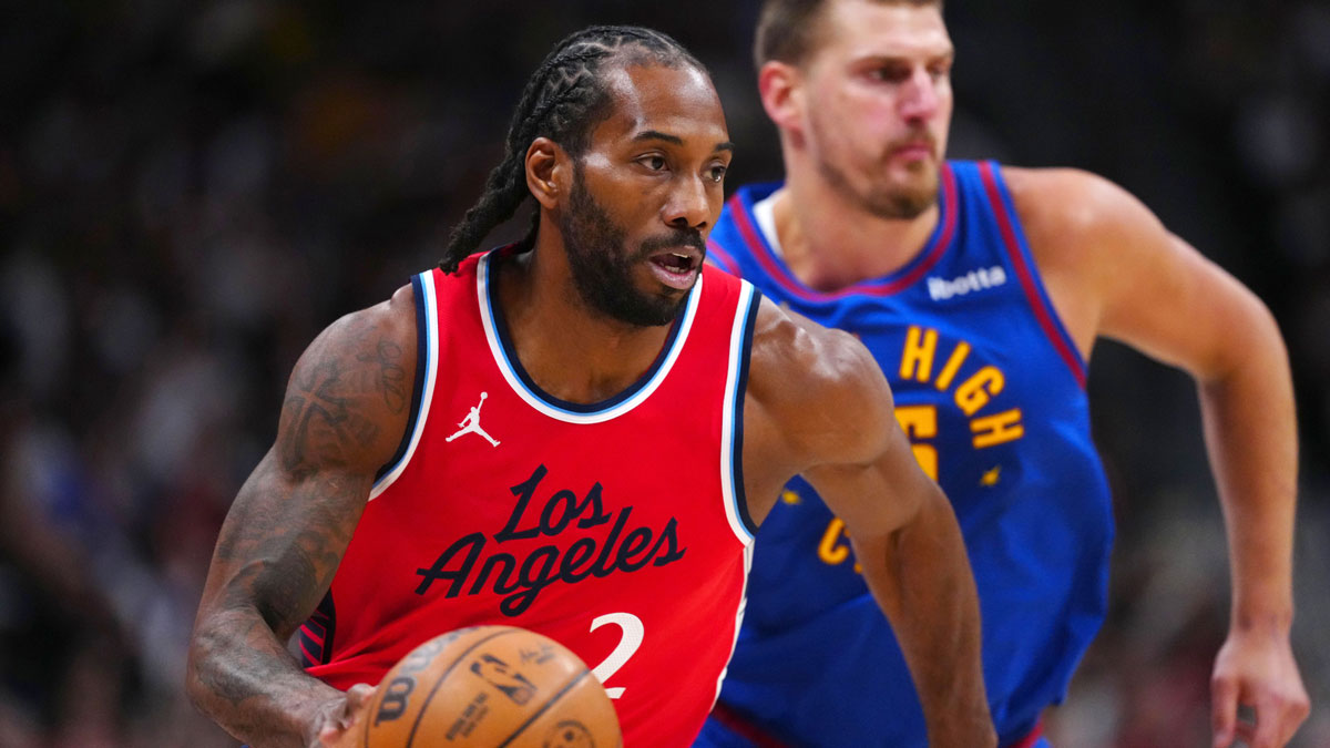 LA Clippers forward Kawhi Leonard (2) controls the ball in the first quarter against the Denver Nuggets during game seven of first round for the 2025 NBA Playoffs at Ball Arena.