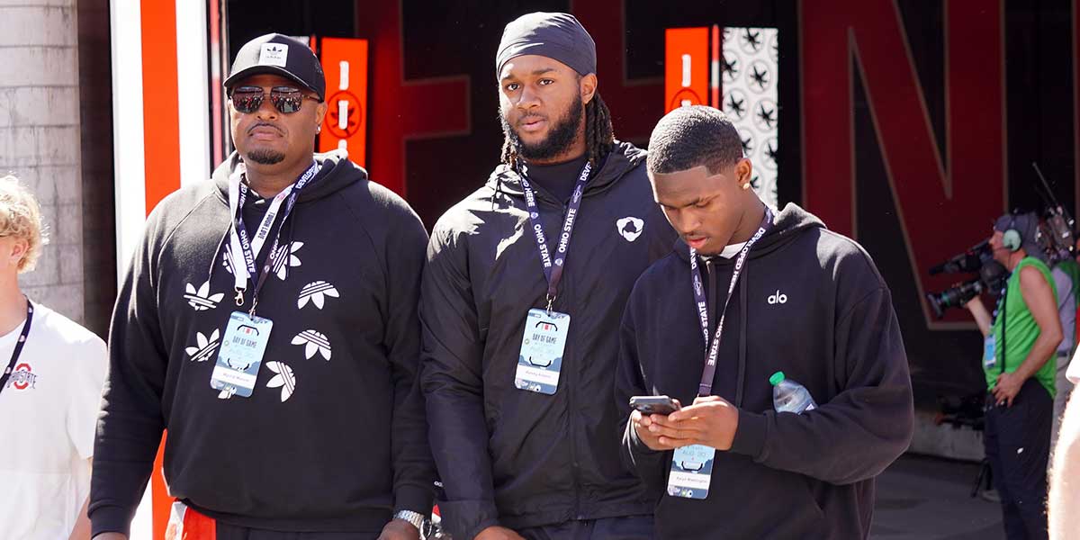 Kelsey Adams (in middle), a Langston Hughes offensive tackle, soaks up the atmosphere of the game between the Ohio State Buckeyes and Texas Longhorns at Ohio Stadium on Aug. 30, 2025.
