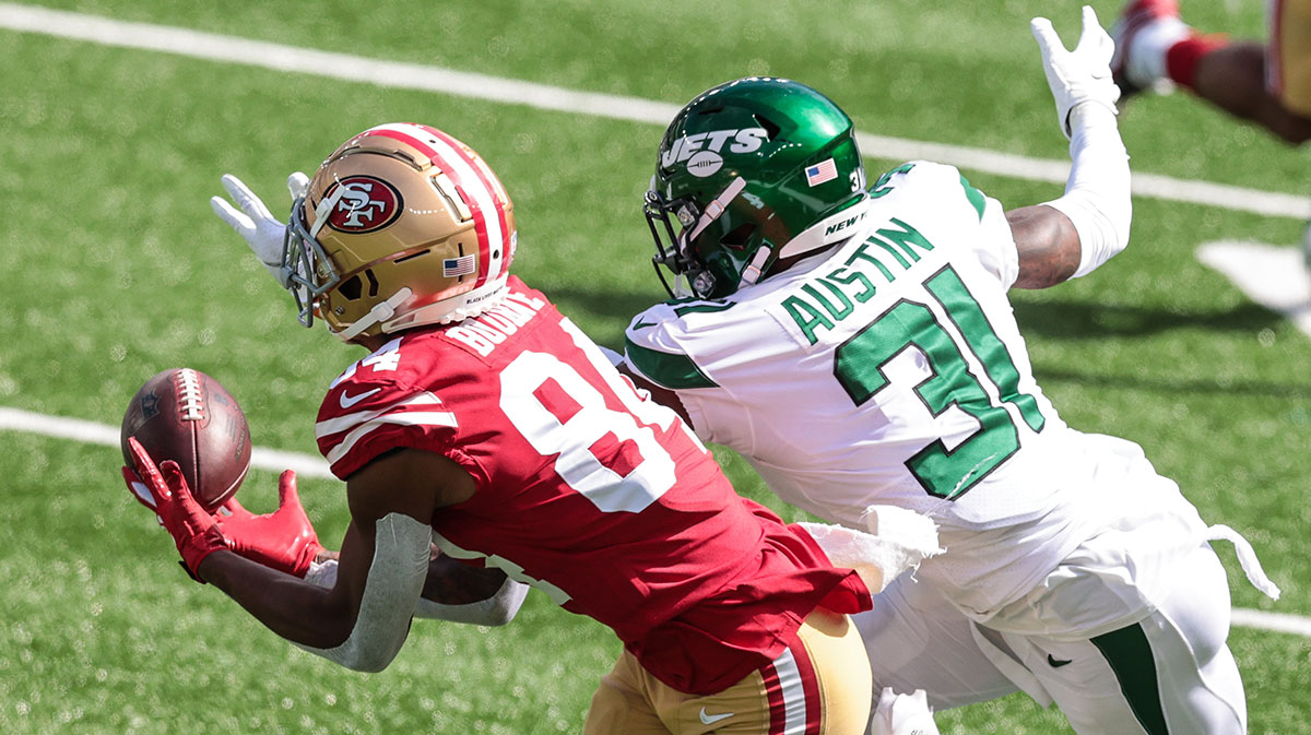 San Francisco 49ers wide receiver Kendrick Bourne (84) attempts to make a catch as New York Jets cornerback Blessuan Austin (31) defends during the first half at MetLife Stadium