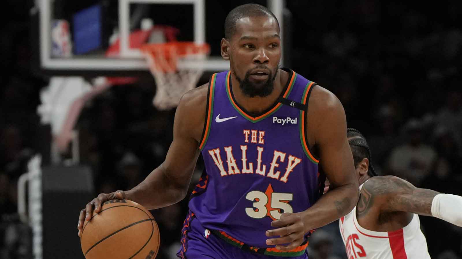Phoenix Suns forward Kevin Durant (35) drives against the Houston Rockets in the first half at Footprint Center. 