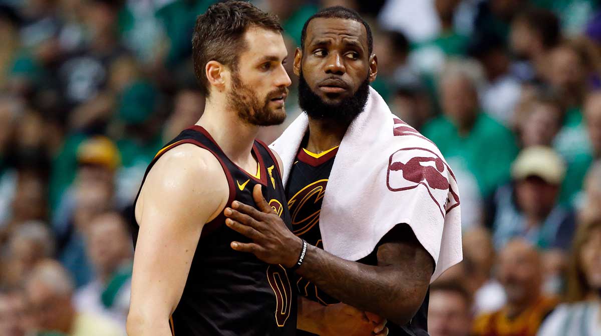 Cavaliers center Kevin Love (0) and forward LeBron James (23) talk during the second quarter of game five against the Boston Celtics in the Eastern conference finals of the 2018 NBA Playoffs at TD Garden