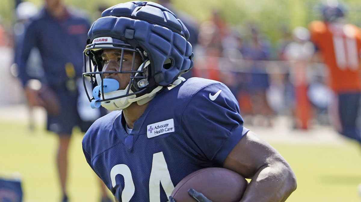 Chicago Bears running back Khalil Herbert (24) runs with the ball during Chicago Bears Training Camp at Halas Hall.
