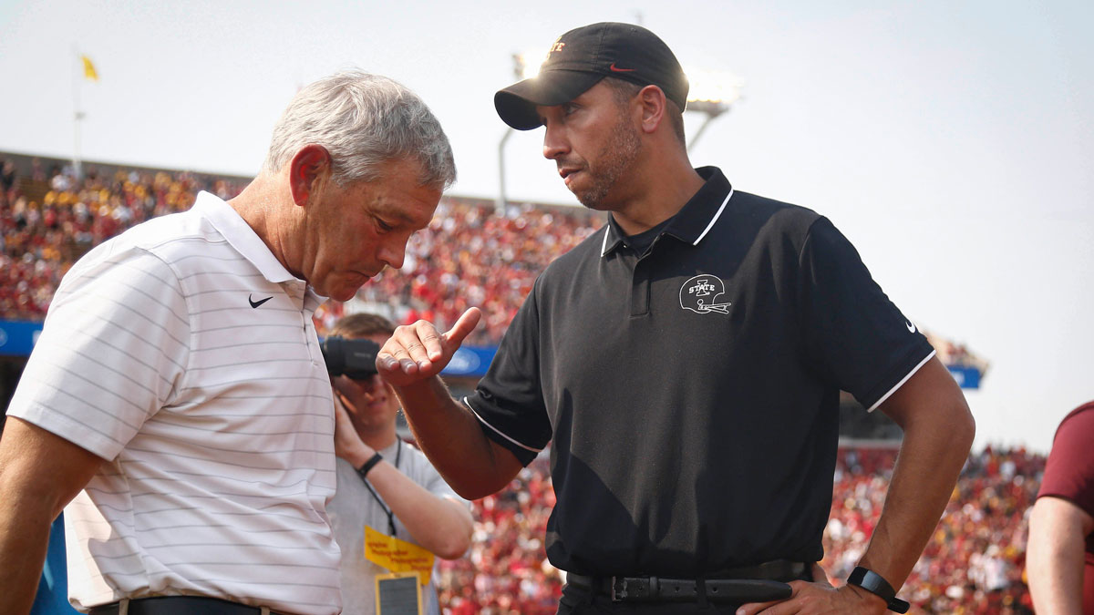 Iowa State head football coach Matt Campbell, right, visits with Iowa head football coach Kirk Ferentz prior to kickoff at Jack Trice Stadium in Ames on Saturday, Sept. 11, 2021. 20210911 Cyhawk