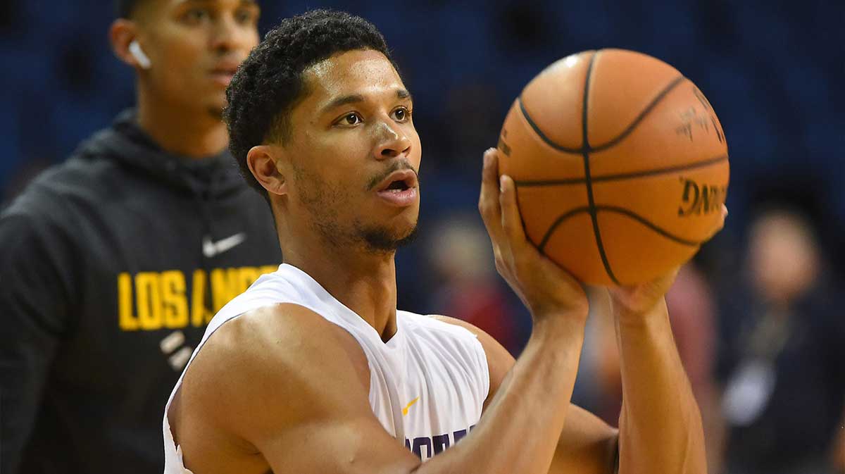 Knicks guard Jordan Clarkson (left) and guard Josh Hart (5) warm up