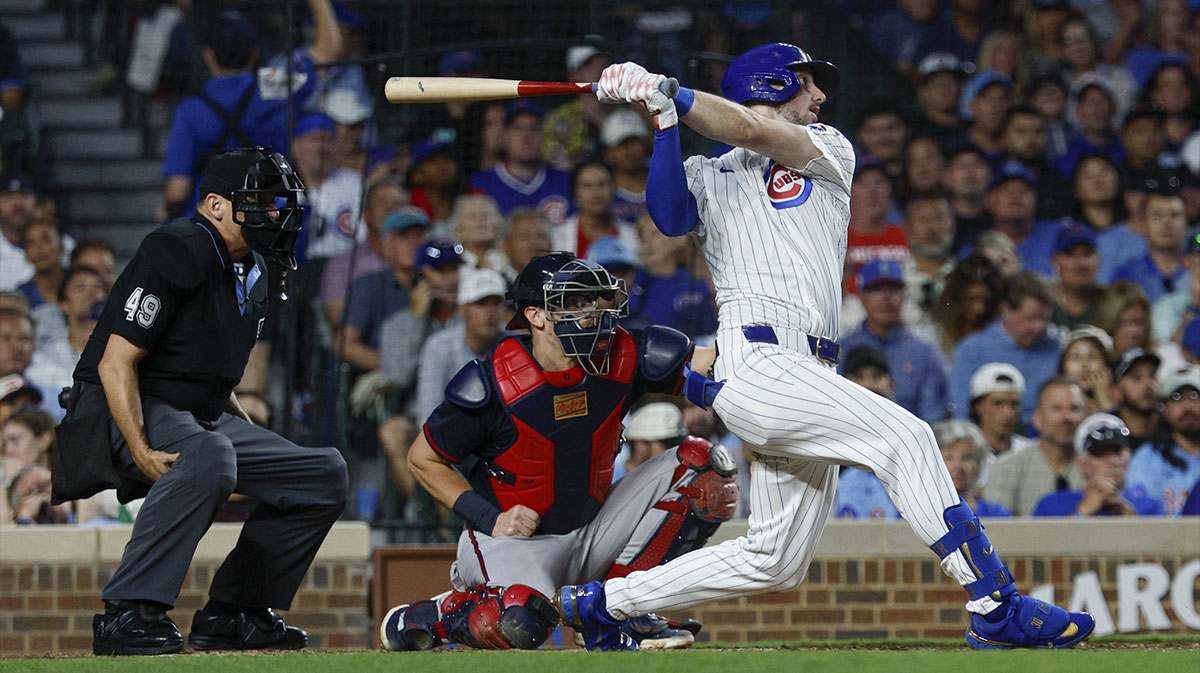 Chicago Cubs right fielder Kyle Tucker (30) hits a three-run home run against the Atlanta Braves during the third inning at Wrigley Field.