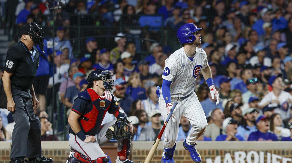 Chicago Cubs right fielder Kyle Tucker (30) hits a three-run home run against the Atlanta Braves during the third inning at Wrigley Field.