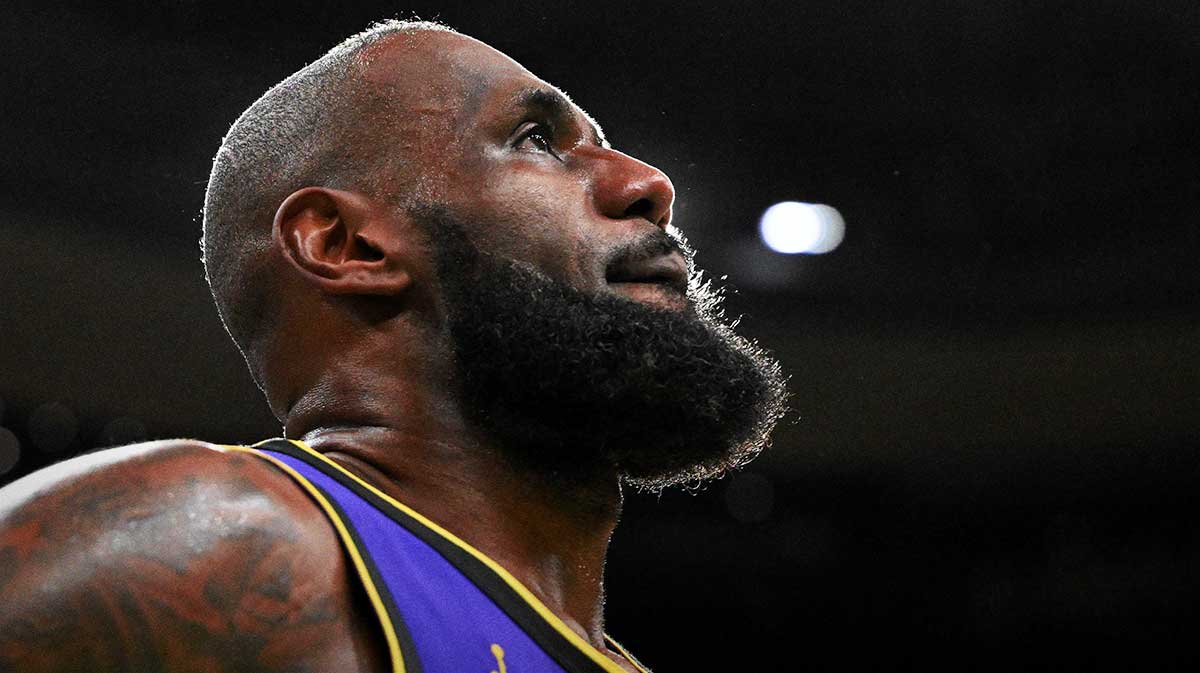 Los Angeles Lakers forward LeBron James (23) looks into the crowd during a timeout in the fourth quarter of a game against the Boston Celtics at the TD Garden.