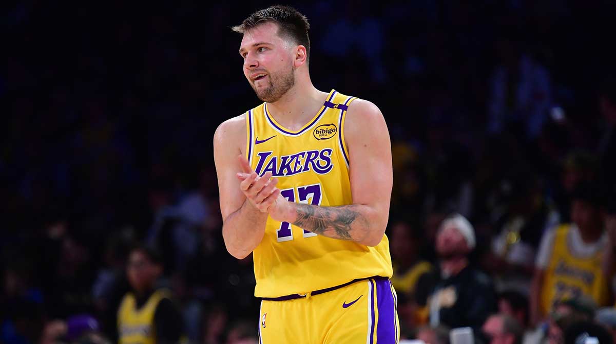 Lakers guard Luka Doncic (77) reacts during the second half in game five of first round for the 2025 NBA Playoffs at Crypto.com Arena with Paul George in the background