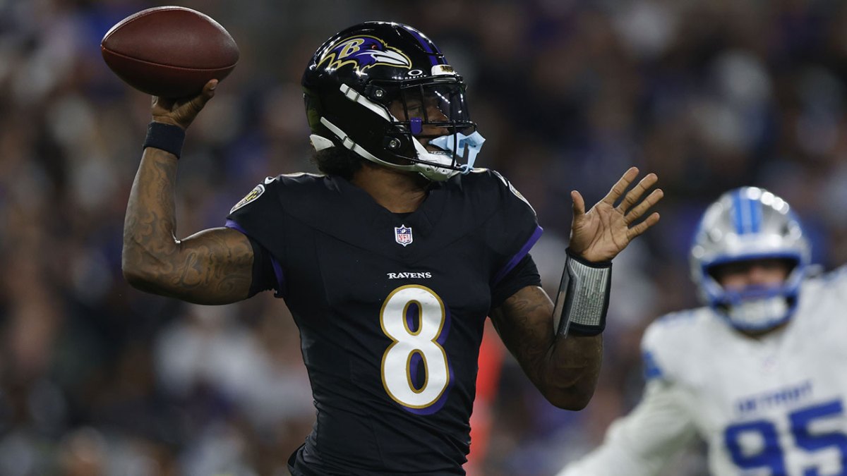 Baltimore Ravens quarterback Lamar Jackson (8) drops back to pass against the Detroit Lions during the first half at M&T Bank Stadium.
